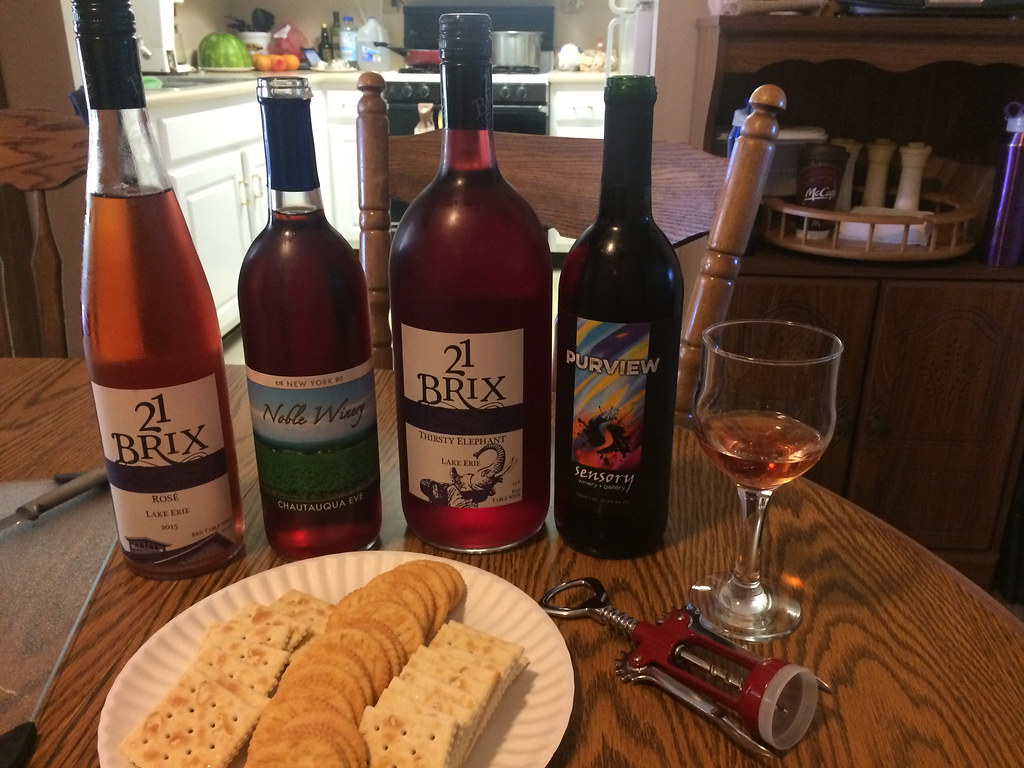 21 Brix Rosé, Noble Winery Chataqua Eve, 21 Brix Thirsty Elephant and Sensory Winery Purview with glass of 21 Brix Rosé