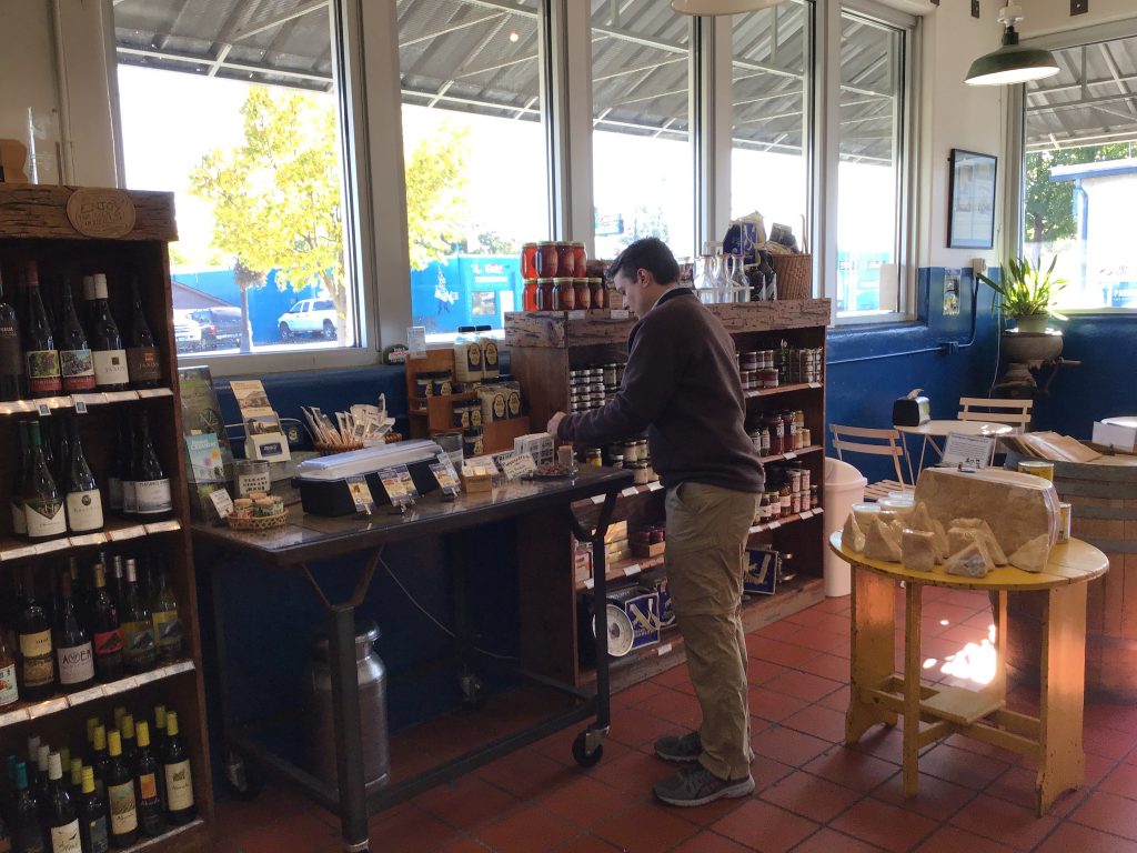 Neil trying a few samples in the Rogue Creamery Gift Shop, Central Point, OR