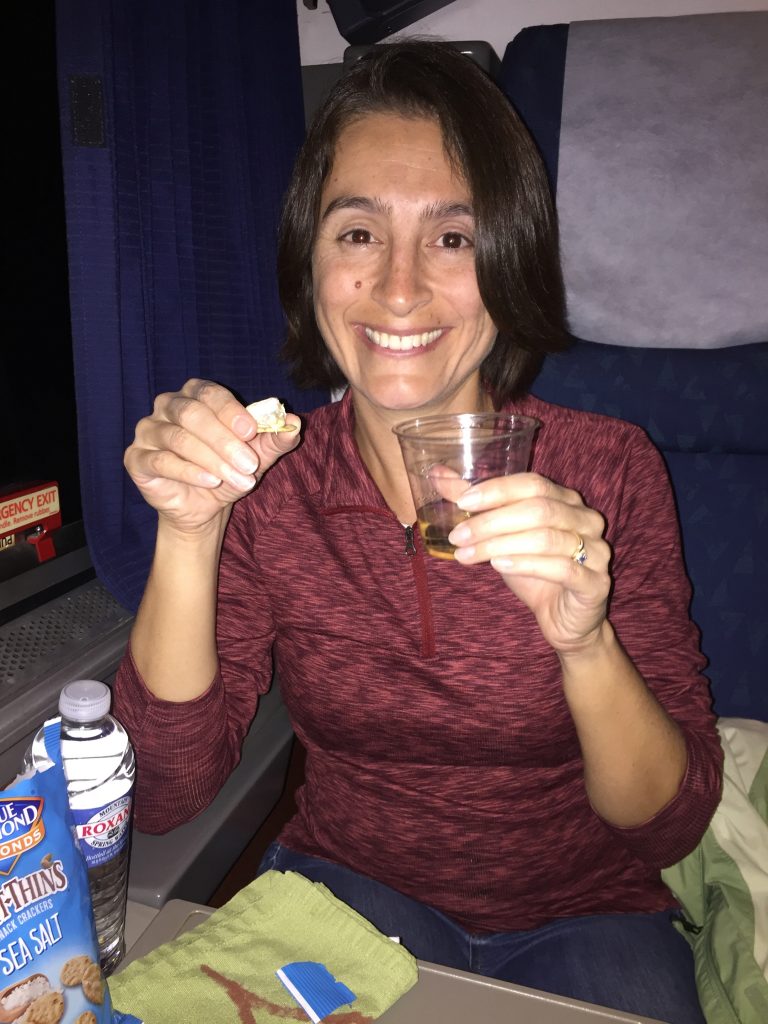 Maria with her wine and cheese on the train
