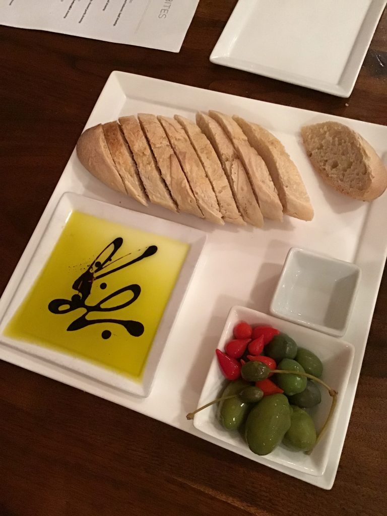 bread and oil with olives