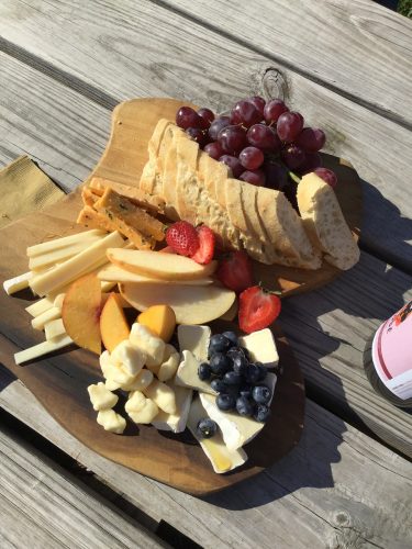 Our cheese tray with Cheddar with chives, Tutti Bella, Garlic curds, and brie