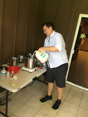 Neil is getting us started with the cheesemaking